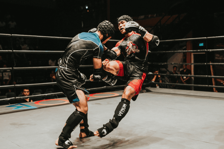 Boxers fighting in the ring