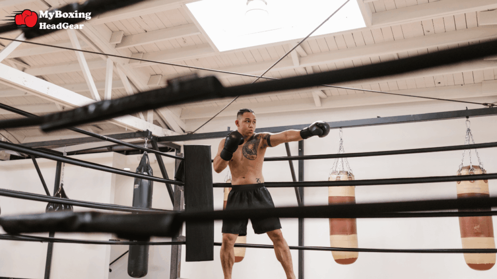 Boxer doing shadowboxing in the ring